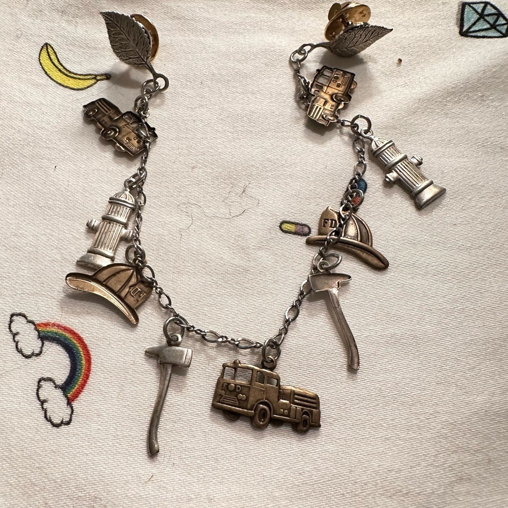 Oddity, Silver And Brass 1960s? Fire Fighter Charms On Double Pin Help?